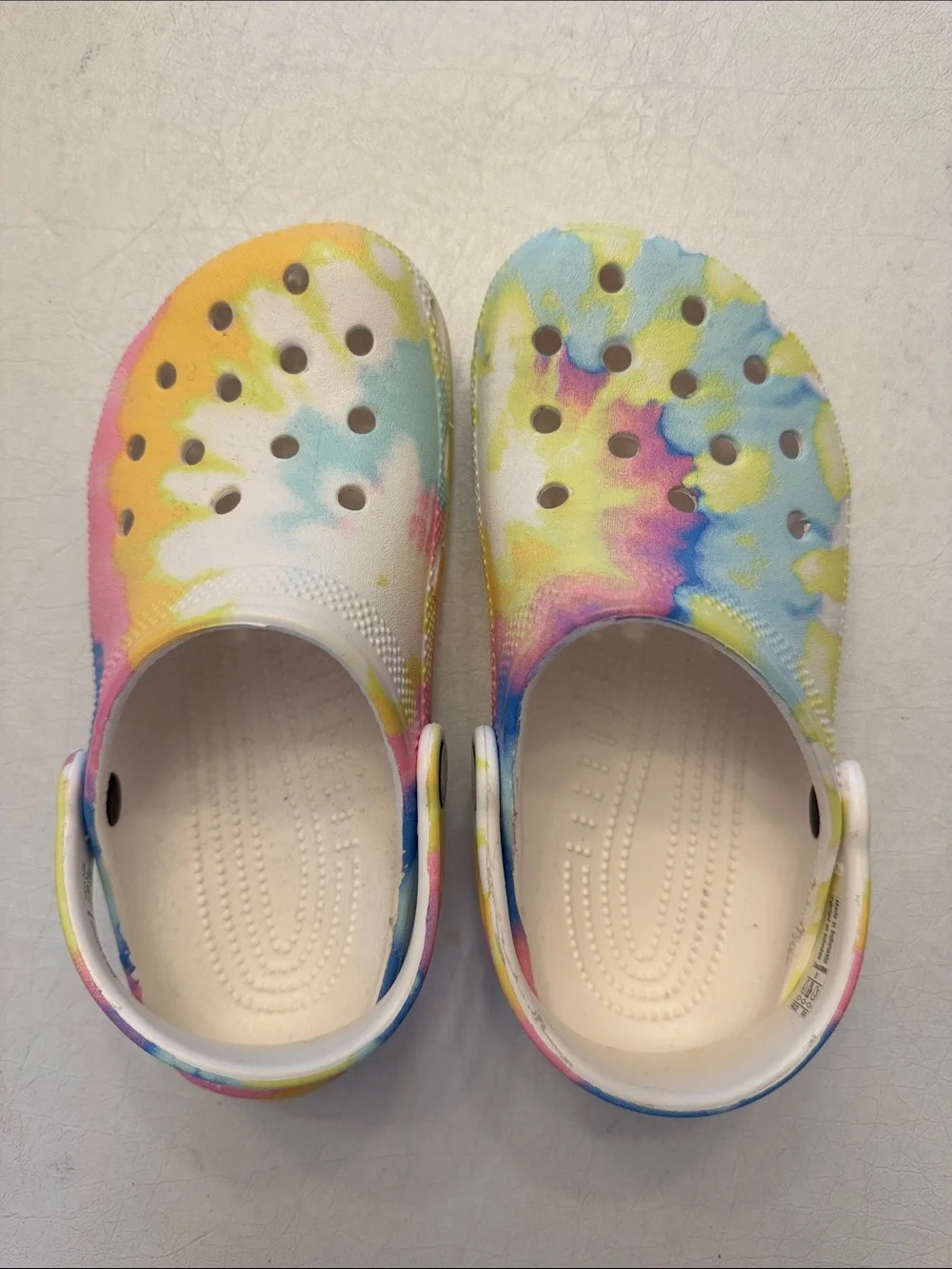 CROCS Kids Tie-Dye Clogs in White, Yellow, Blue, Pink